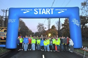 Group shot of the Columbus Running Company volunteers at the Columbus Marathon mile 6 water stop